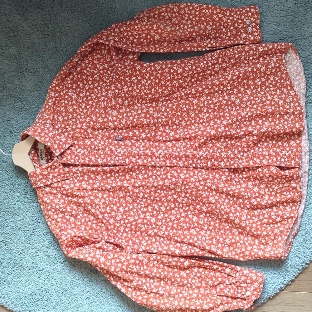 Orange floral print shirt
